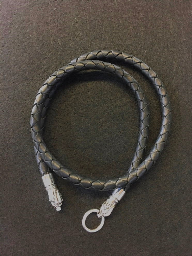 lion choker. Braided leather and thick necklace.  BICO leather products are made using only genuine cow hide leather.  Because leather is a natural product, the colour and textures of each piece will differ slightly.  The metal fittings are made of silver.