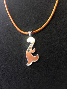 mermaid pendant top of back side with brown leather chain . meaning: water baby sensuality.