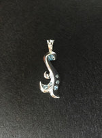 Load image into Gallery viewer, mermaid pendant top with swarovski&#39;s light blue color. meaning: water baby sensuality.
