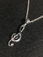 画像をギャラリービューアに読み込む, behind-the-treble-clef-pendant.　meaning : passion for music.
