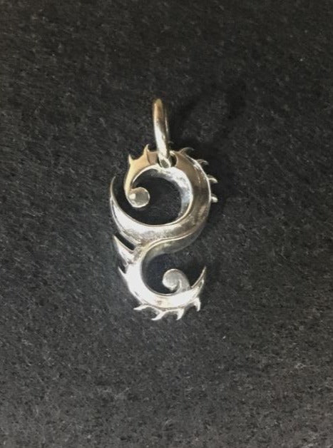 dragon-flame-pendant. meaning : guardian of prosperity