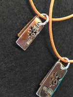 画像をギャラリービューアに読み込む, kings and queens twin pendants of backside.meaning : the world is our throne.  burnt brown leather tags.
