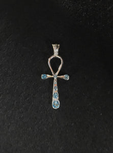 nefertiti pendant top of swarovski's light blue color. meaning:mysterious beauty