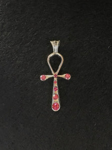 nefertiti pendant top of swarovski's pink color. meaning:mysterious beauty