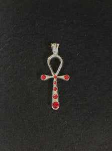 nefertiti pendant top of swarovski's red color. meaning:mysterious beauty