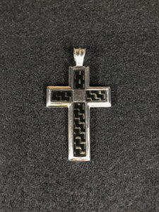 tech-cross-pendant. meaning : a meld of past and the future.  Carbon and silver material．