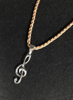 画像をギャラリービューアに読み込む, treble-clef-pendant-and-braided-necklace．　meaning : passion for music.
