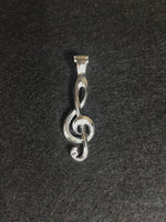 画像をギャラリービューアに読み込む, treble-clef-pendant.　meaning : passion for music.
